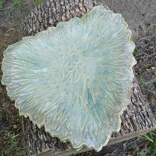 Artesian.
Handmade Light blue/ multi color platter